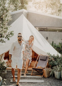httpselements.envato.comjoyful-woman-goes-with-her-husband-out-of-camp-to-CVBZP5H-1.jpg